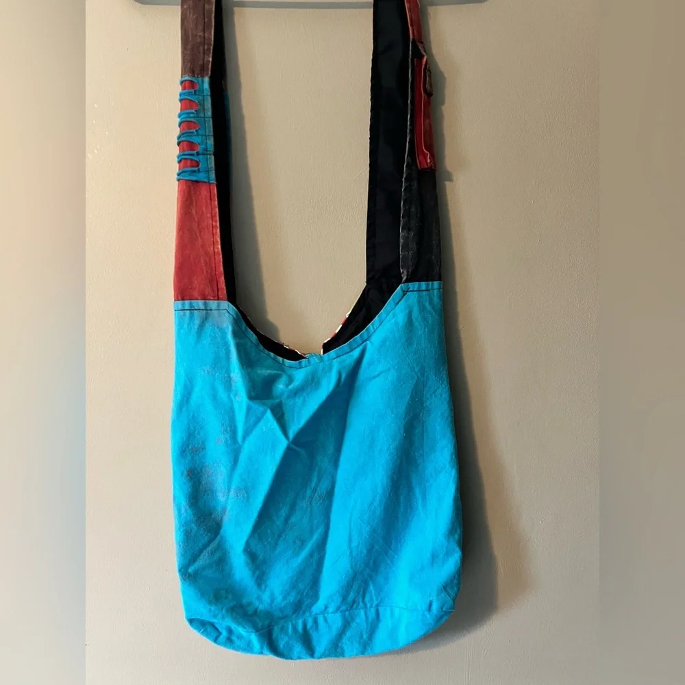 Rising International Americana Eagle bag with button and zip closure crossbody.